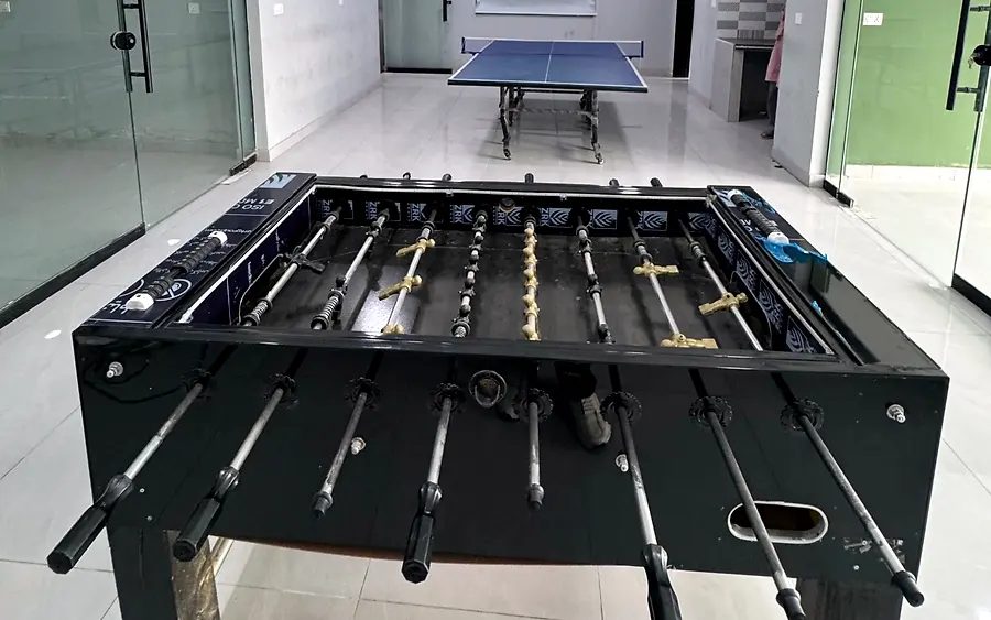 The games room upstairs, with a foosball table and table tennis