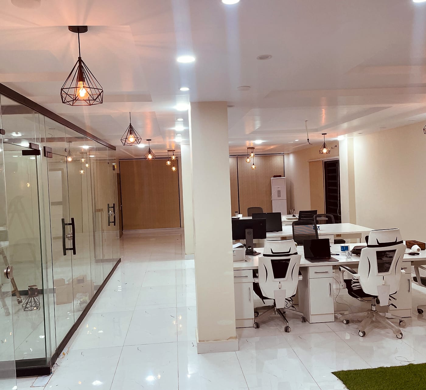 The floor, looking down the glass offices at CodeUp Spaces, Wapda Town