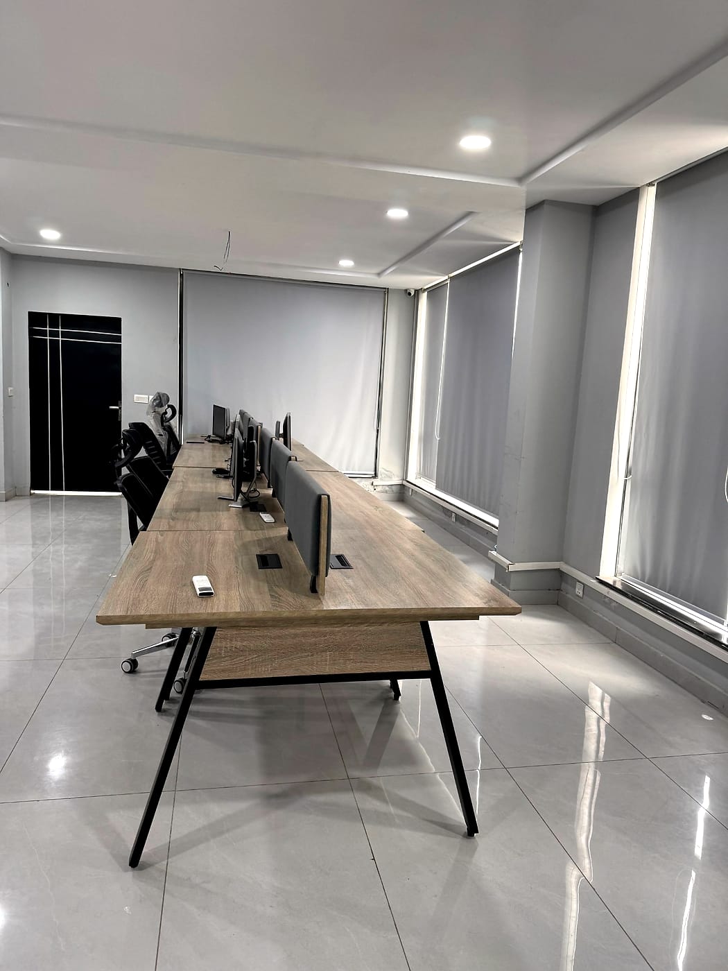 Dedicated desks with privacy dividers at CodeUp Spaces, Wapda Town